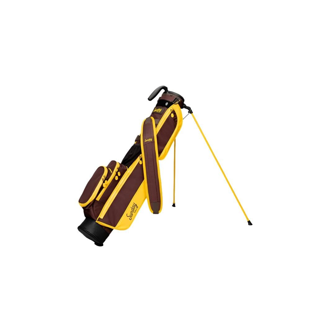 A yellow and maroon golf bag with a full-length shoulder strap and stand, set against a white background.