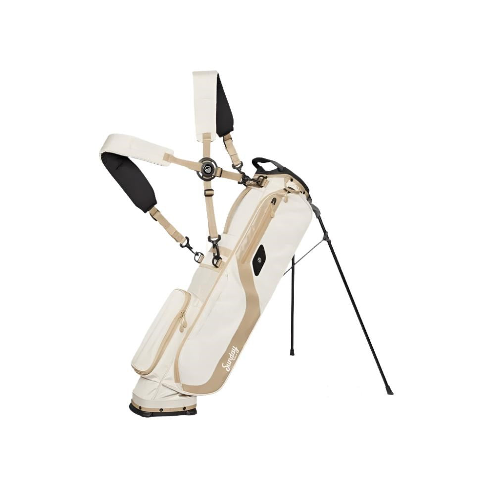 White and beige golf bag with stand on a white background