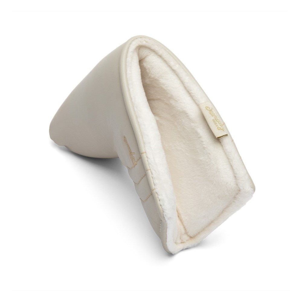 A beige vegan leather golf putter headcover with a magnetic closure.
