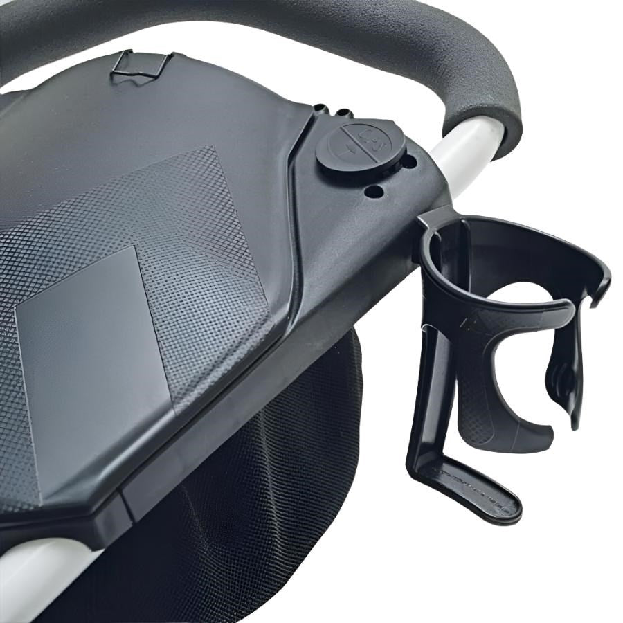 A black golf cart beverage holder attached to a seat.