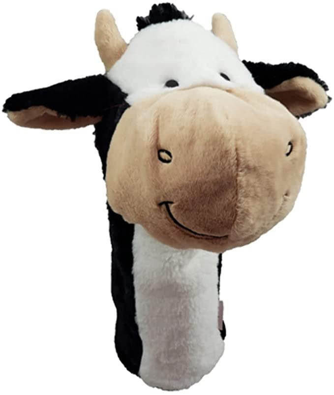 A plush golf club headcover designed to look like a cow with a predominantly beige and black color scheme.