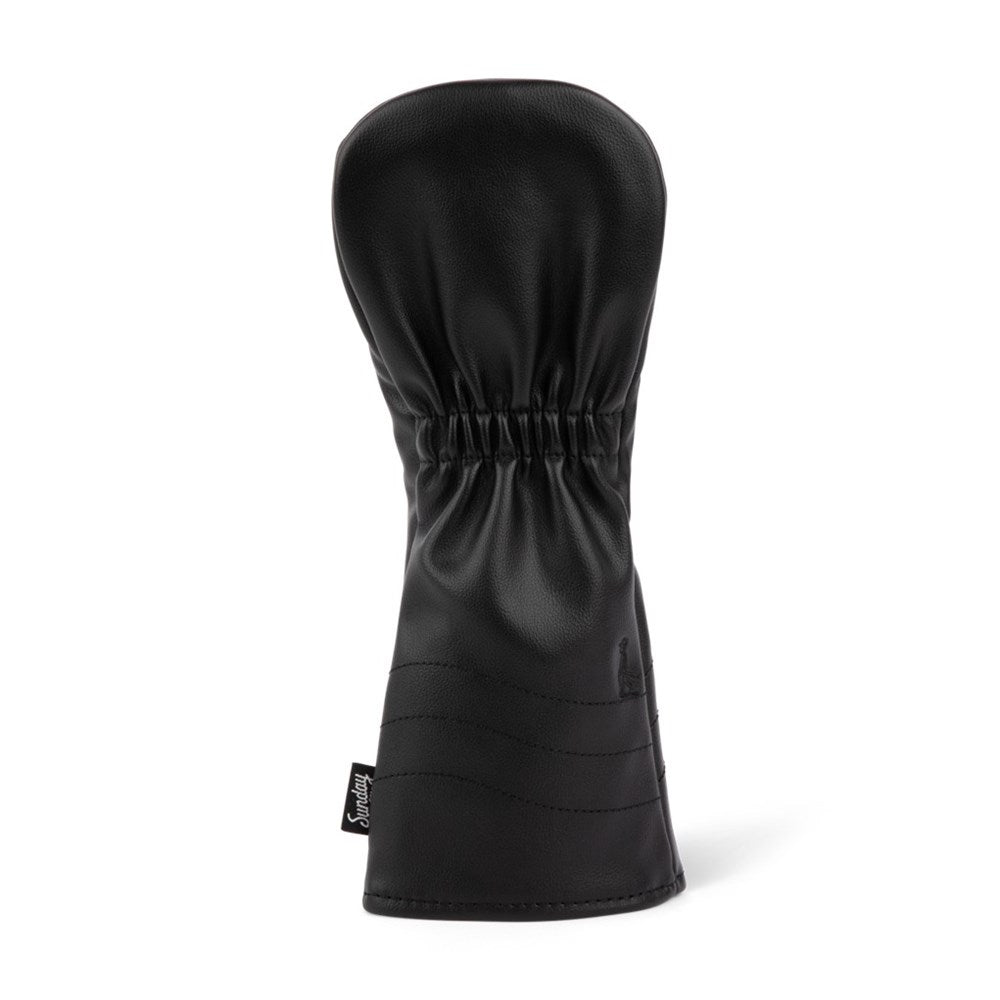 A black vegan leather fairway wood headcover with a circular logo emblem in the center.