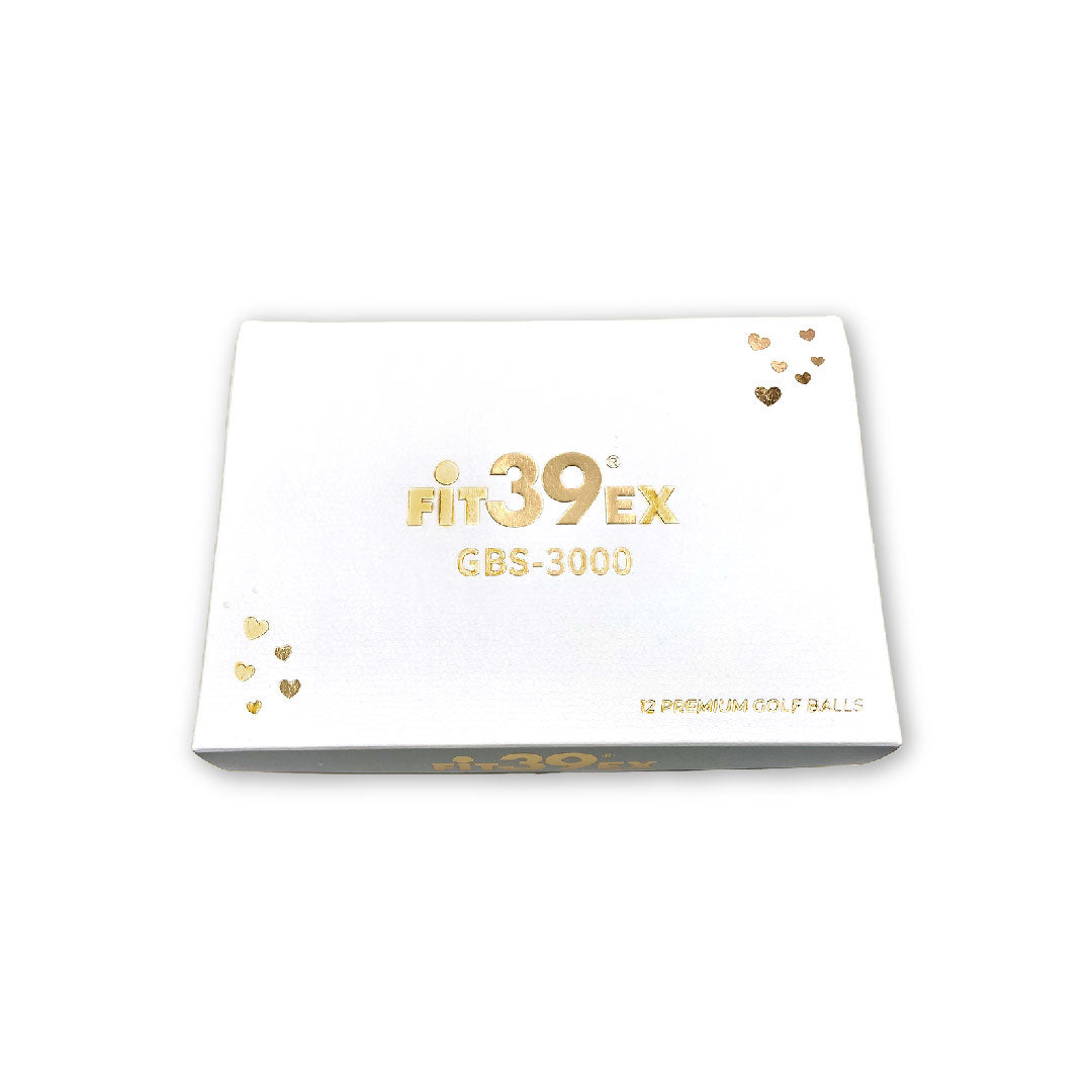 A box of FIT39EX GBS-3000 golf balls with branding visible on the packaging.