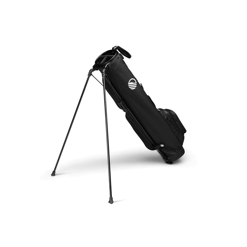 A black golf bag with a stand system, multiple pockets, and a double strap.