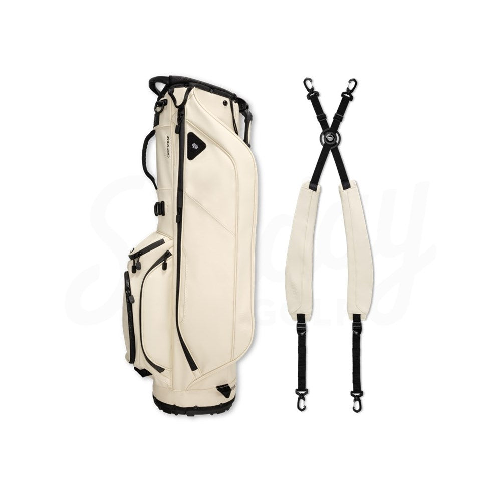 A beige Sunday Golf Ryder S-Class golf bag with a stand, featuring multiple pockets and a detached shoulder straps.