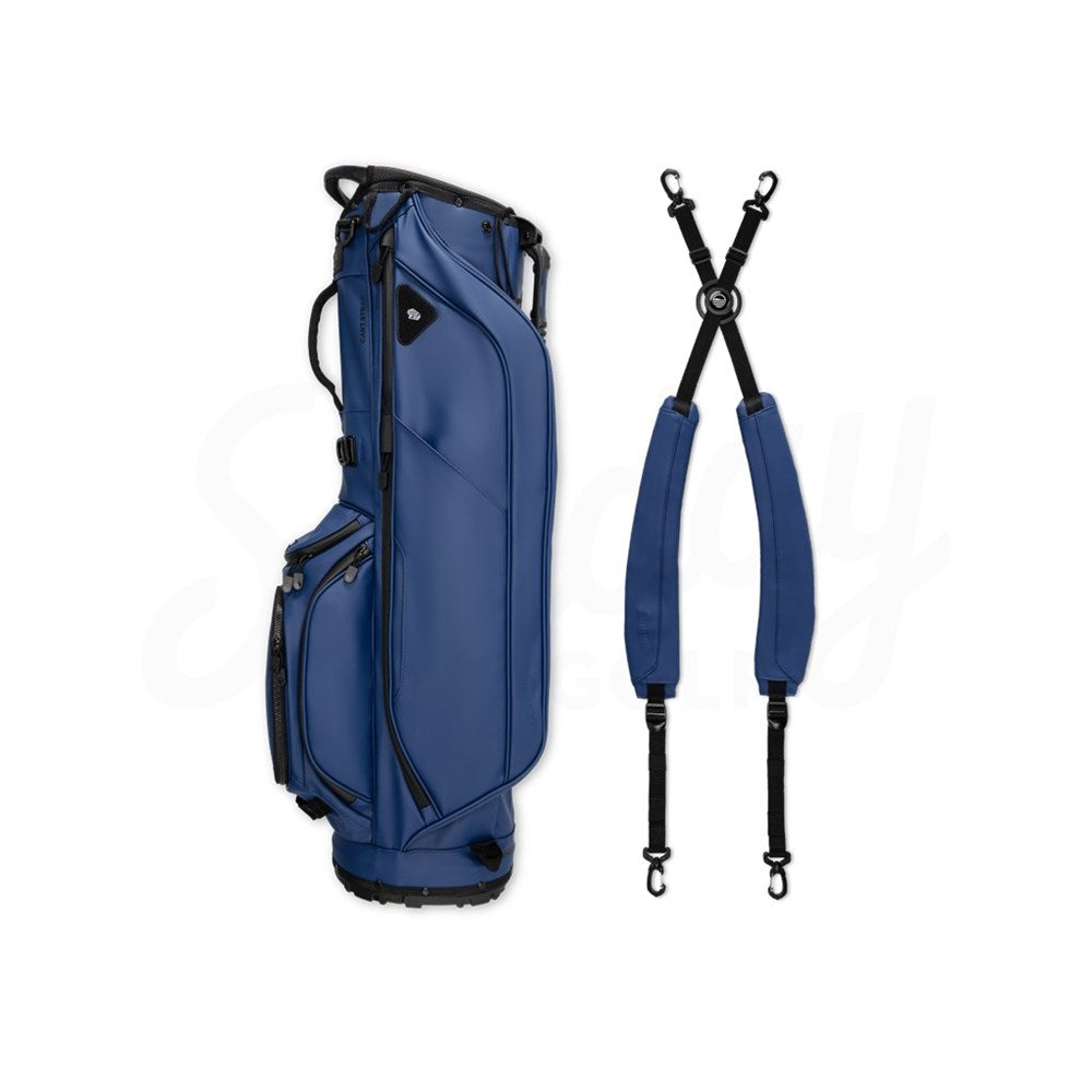 A navy blue golf bag with a stand, multiple pockets, and a detachable shoulder straps.