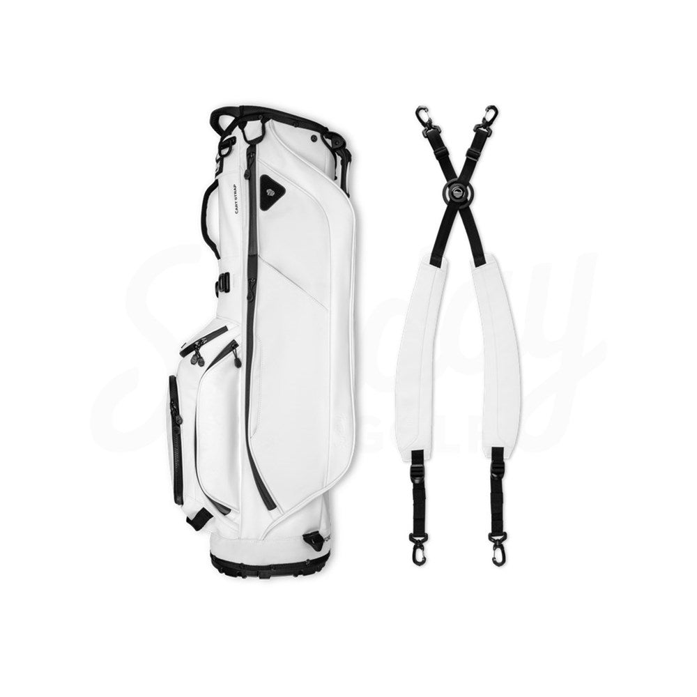 A white Sunday Golf stand bag made of vegan leather, featuring multiple pockets and a full-length divider, detachable shoulder straps.