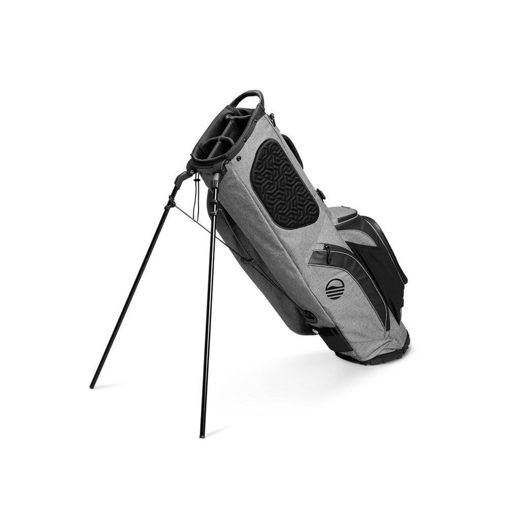 A full-size stand golf bag with multiple pockets, a built-in carry handle, and a backpack-style strap system unfolded.