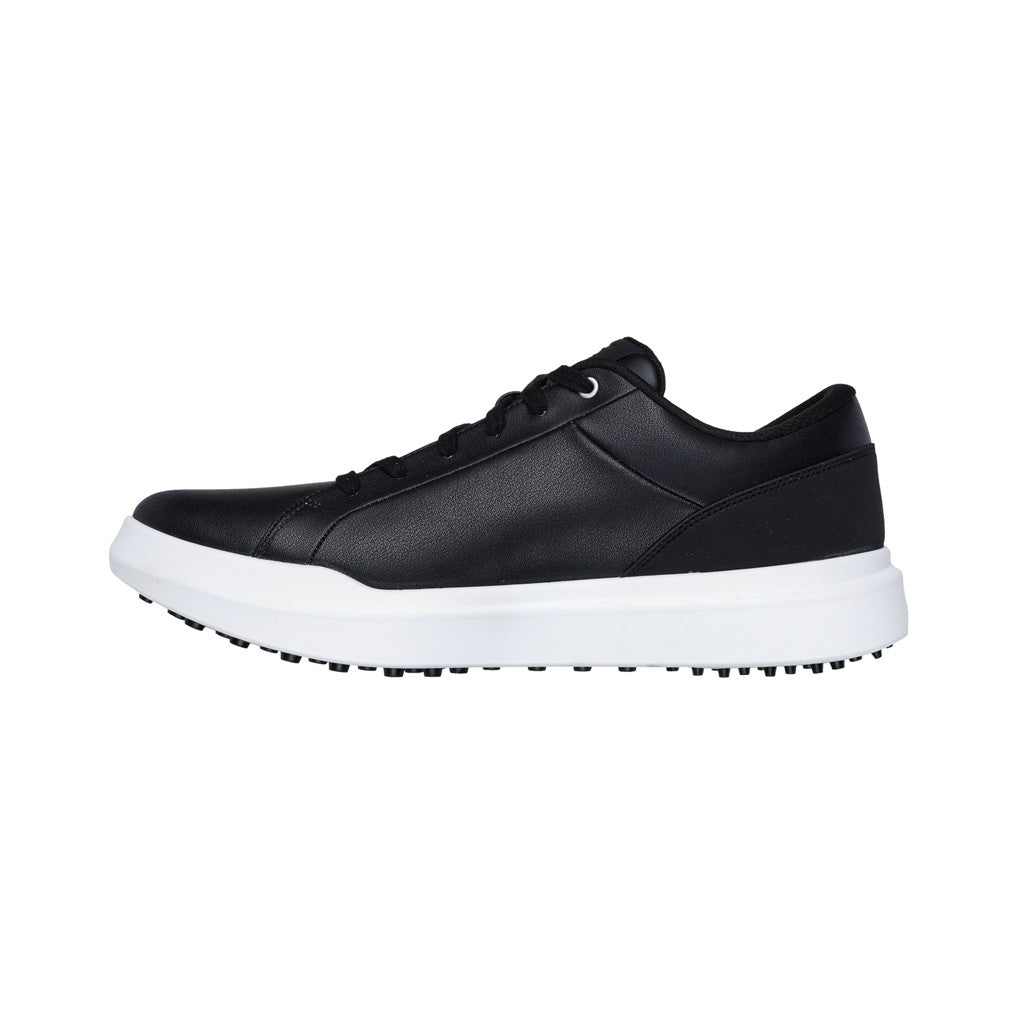 A black Skechers GO GOLF Drive 6 spikeless golf shoe with a white sole, featuring a lace-up front