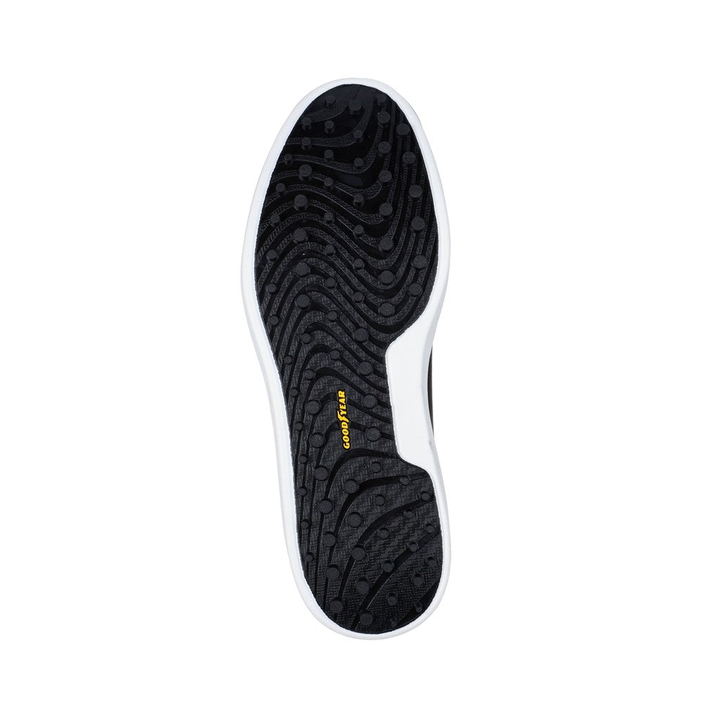 A black Skechers GO GOLF Drive 6 spikeless golf shoe with a white sole, featuring a lace-up front. Sole view