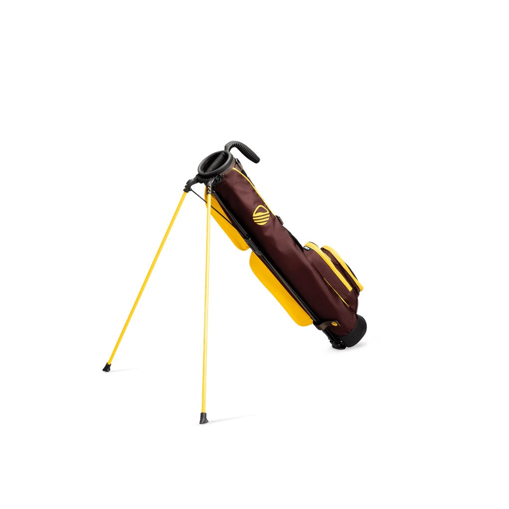 A yellow and maroon golf bag with a full-length shoulder strap and stand, set against a white background.