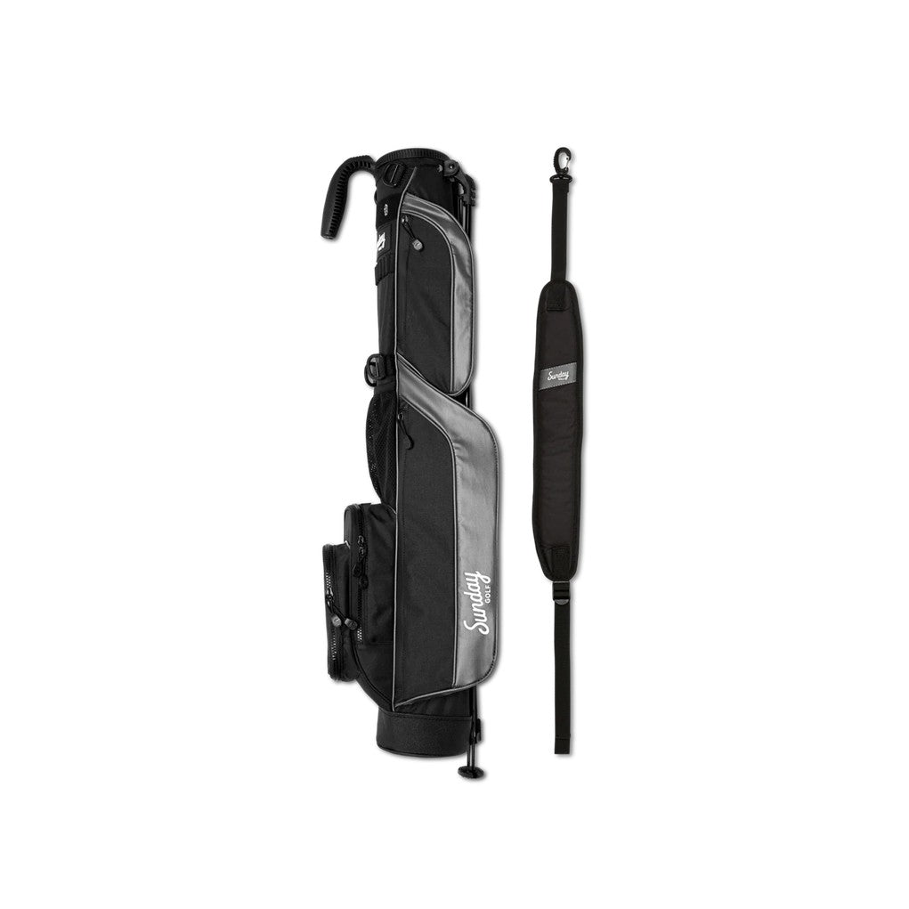 A black golf bag with a stand system, shoulder strap, and multiple pockets, detachable straps designed for carrying golf clubs and accessories.