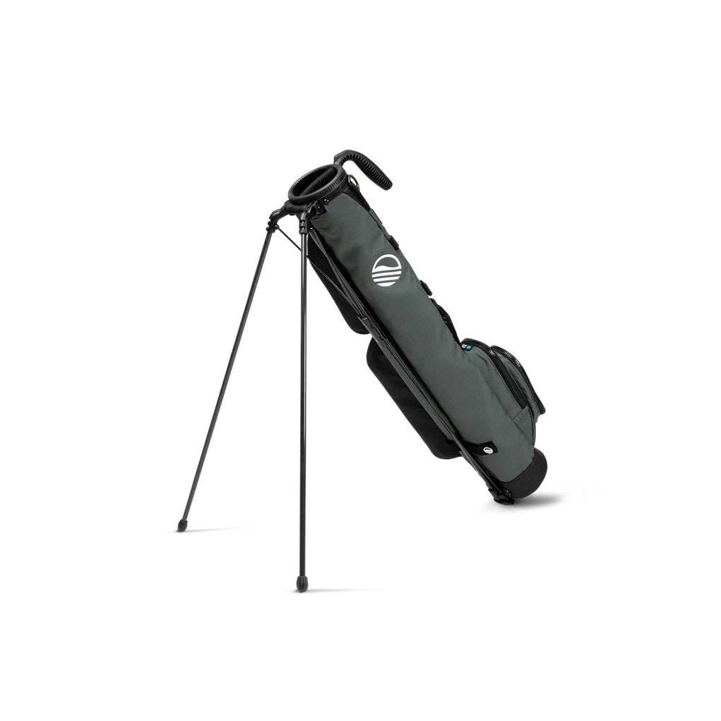 A black golf bag with a stand, multiple pockets, and a shoulder strap.