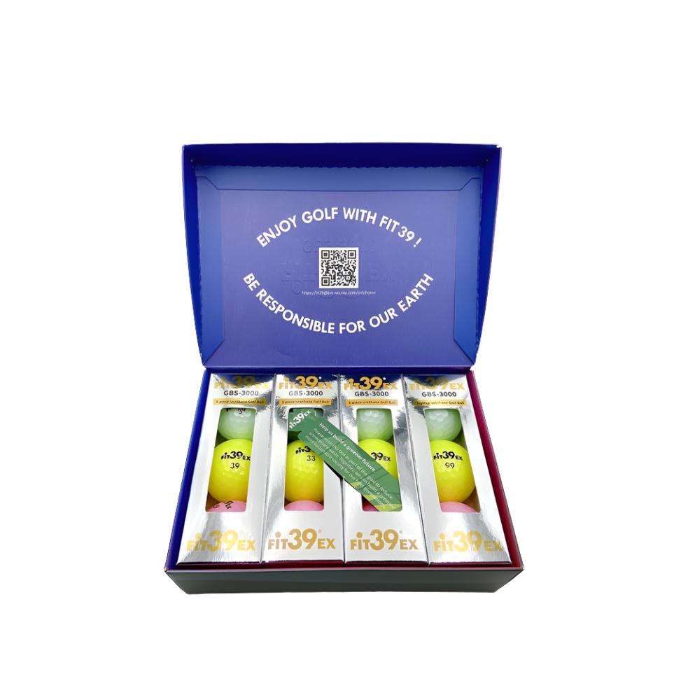 A box of FIT39EX GBS-3000 golf balls with branding visible on the packaging.