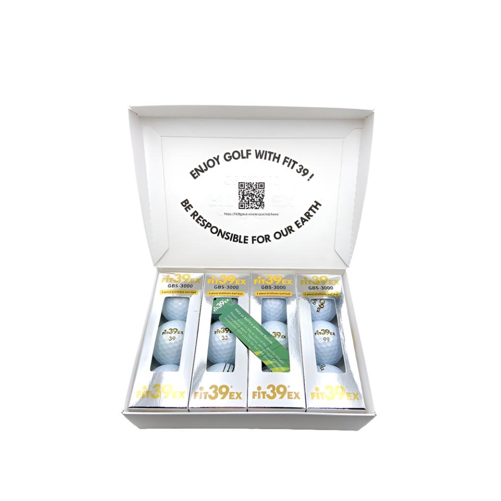 A box of FIT39EX GBS-3000 golf balls with branding visible on the packaging.