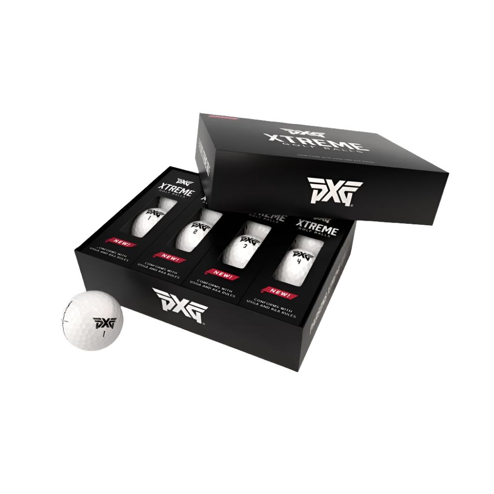 A box of open PXG Xtreme Premium Golf Balls with one golf ball visible in front of the box.