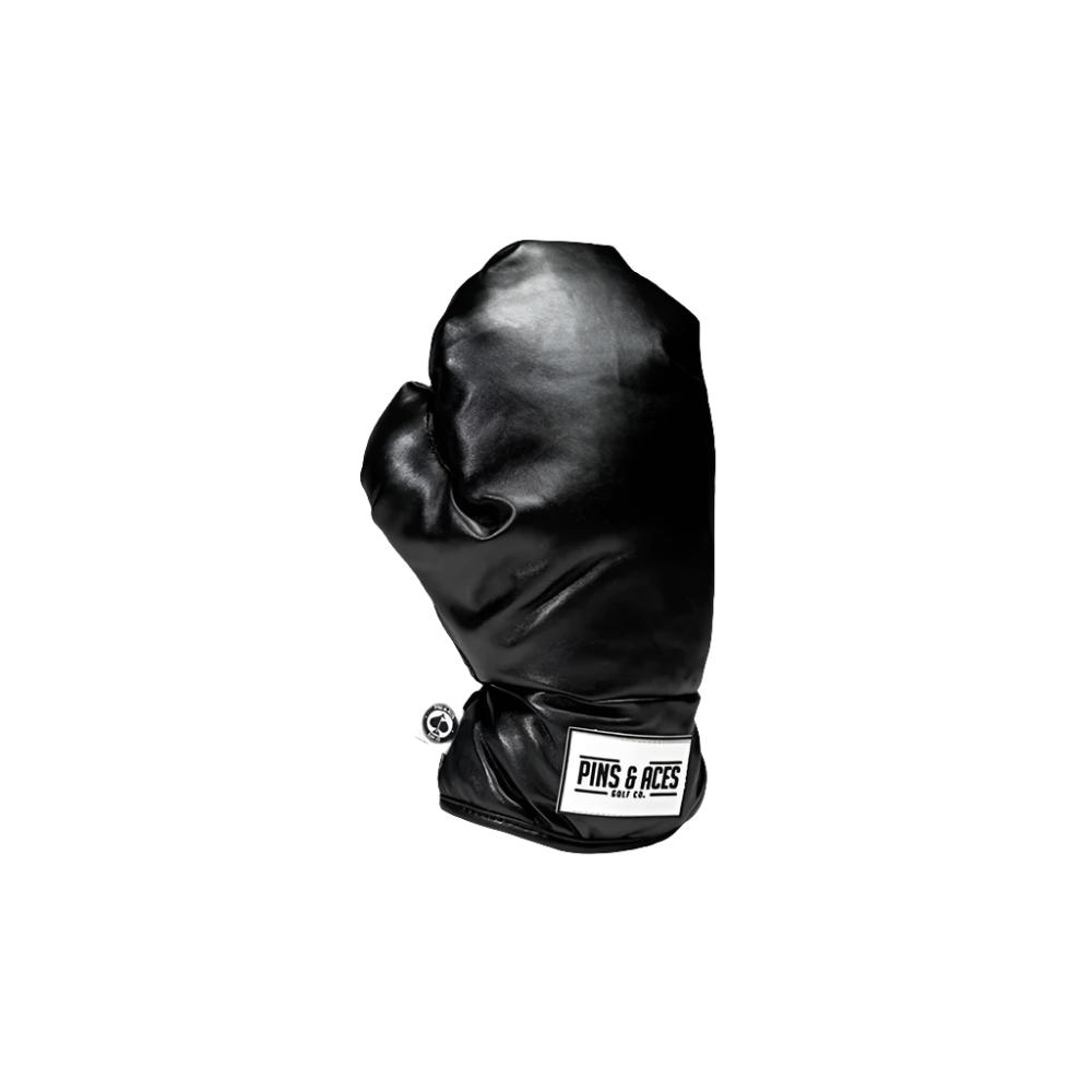 A colorful driver headcover featuring embroidered text and images