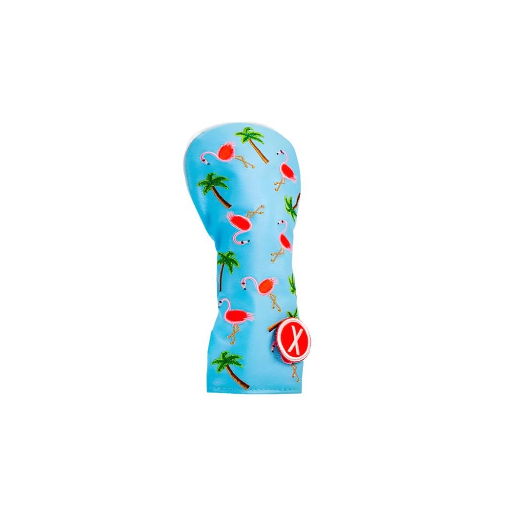 A blue golf club headcover with a multicolor design featuring palm trees, pineapples, and the letter 'X'.