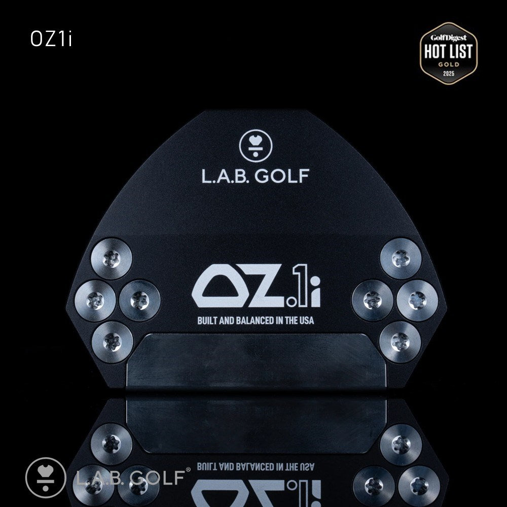 Golf club head with L.A.B. Golf and OZ1i branding on a black background